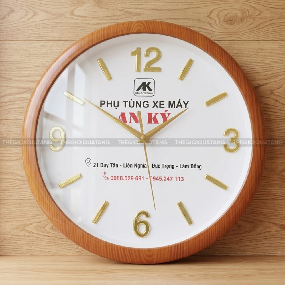 Đồng hồ treo tường in logo Phụ Tùng Xe Máy An Ký 1