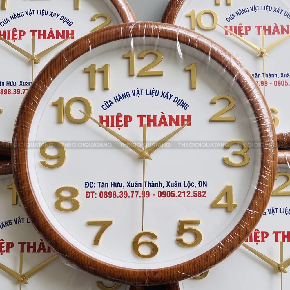 Đồng hồ treo tường quảng cáo in logo công ty Cửa Hàng VLXD Hiệp Thành 2